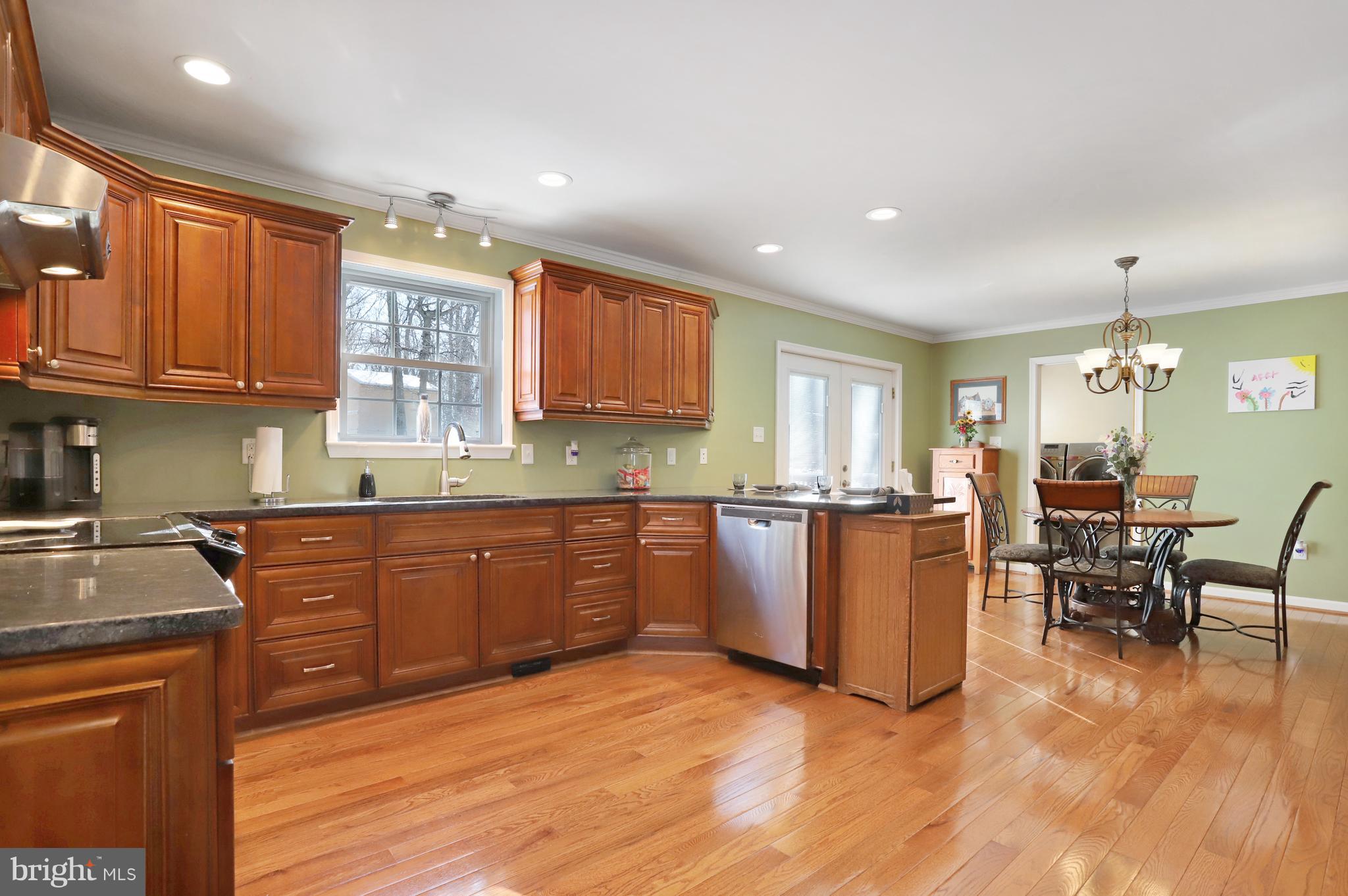 12315 Forrest Hill Road Clear Spring, MD 21722 - Photo 10 of 37 a kitchen with lots of counter top space and furniture
