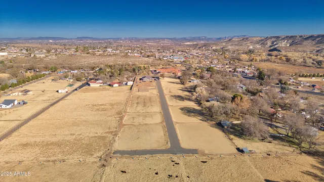 a view of a building with a yard