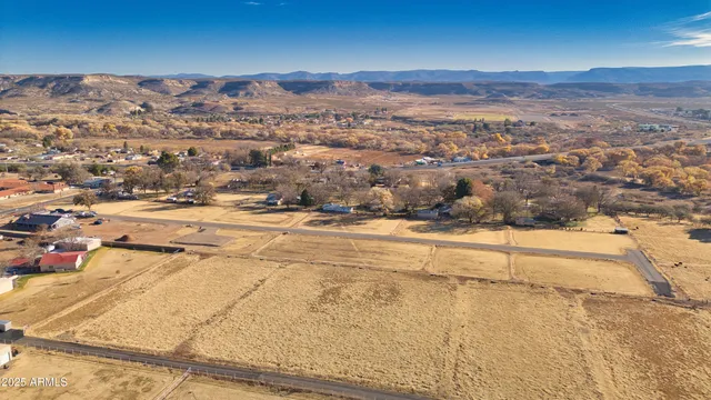 a view of ocean with a mountain