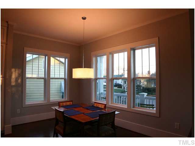 315 Georgetown Road, Unit H Raleigh, NC 27608 - Photo 6 of 20 a dining room with window
