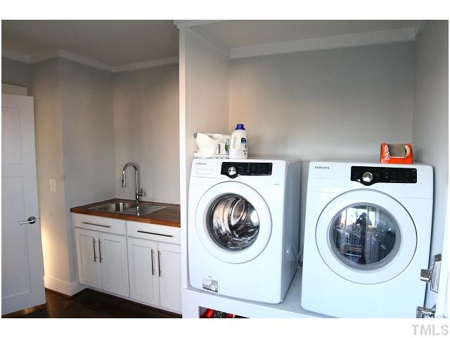 315 Georgetown Road, Unit H Raleigh, NC 27608 - Photo 10 of 20 a utility room with sink dryer and washer