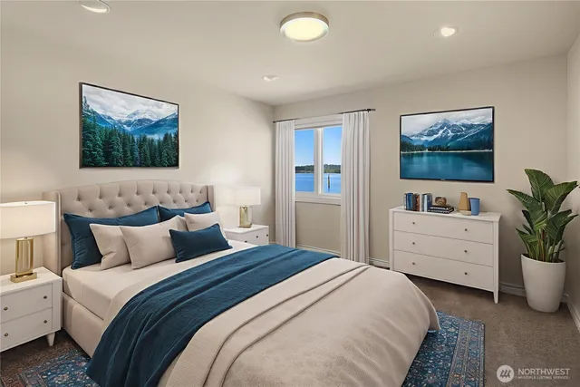 a bedroom with bed cabinet and window