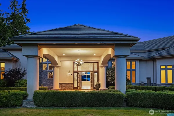 a view of a building with a yard