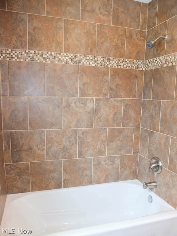 4424 Copley Road Akron, OH 44321 - Photo 10 of 24 Tile shower surround in the master bath.