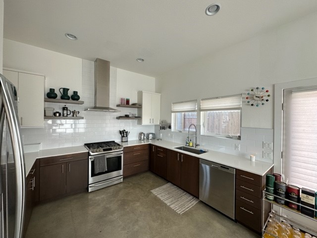 5501 Link Avenue, Unit A Austin, TX 78751 - Photo 12 of 30 a kitchen with stainless steel appliances granite countertop a sink and a stove
