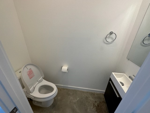 5501 Link Avenue, Unit A Austin, TX 78751 - Photo 15 of 30 a bathroom with a toilet and a sink