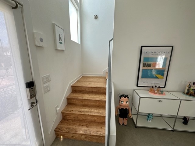 5501 Link Avenue, Unit A Austin, TX 78751 - Photo 16 of 30 a view of hall way with mirror and stairs