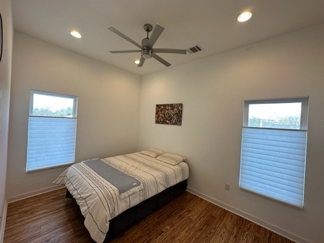 5501 Link Avenue, Unit A Austin, TX 78751 - Photo 19 of 30 a bedroom with a bed and a window