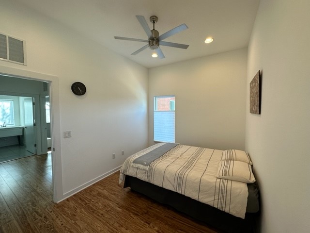 5501 Link Avenue, Unit A Austin, TX 78751 - Photo 20 of 30 a bedroom with a bed and a ceiling fan