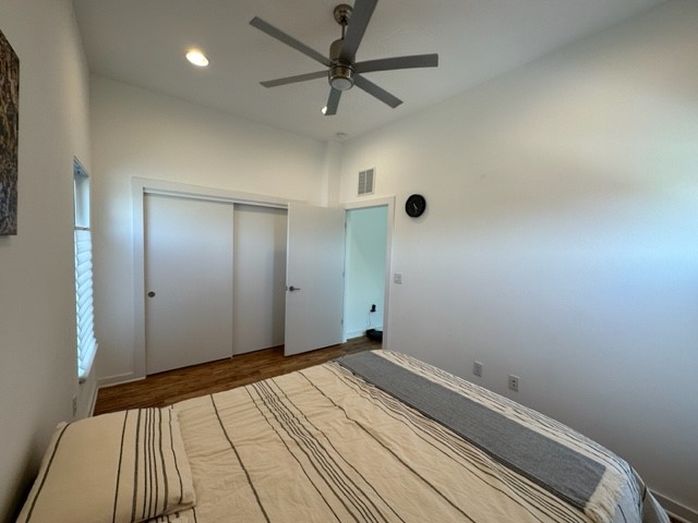 5501 Link Avenue, Unit A Austin, TX 78751 - Photo 21 of 30 a view of a livingroom with a ceiling fan and wooden floor