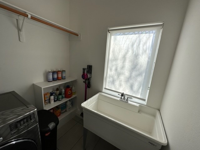 5501 Link Avenue, Unit A Austin, TX 78751 - Photo 25 of 30 a bathroom with a sink and a window