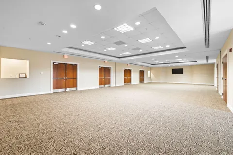 a view of a building with a garden