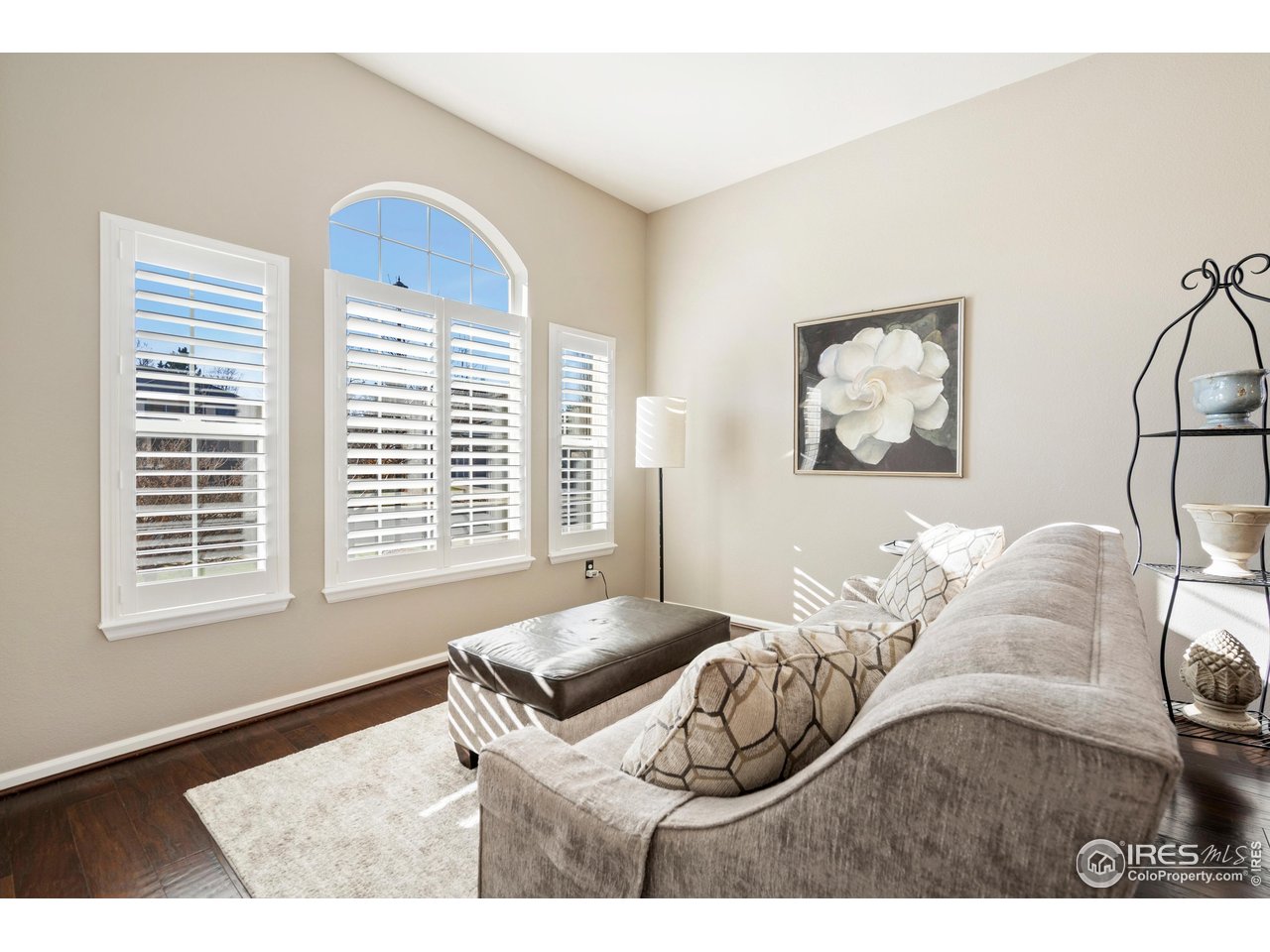 6685 Sage Avenue Firestone, CO 80504 - Photo 4 of 22 a bedroom with a bed and a window