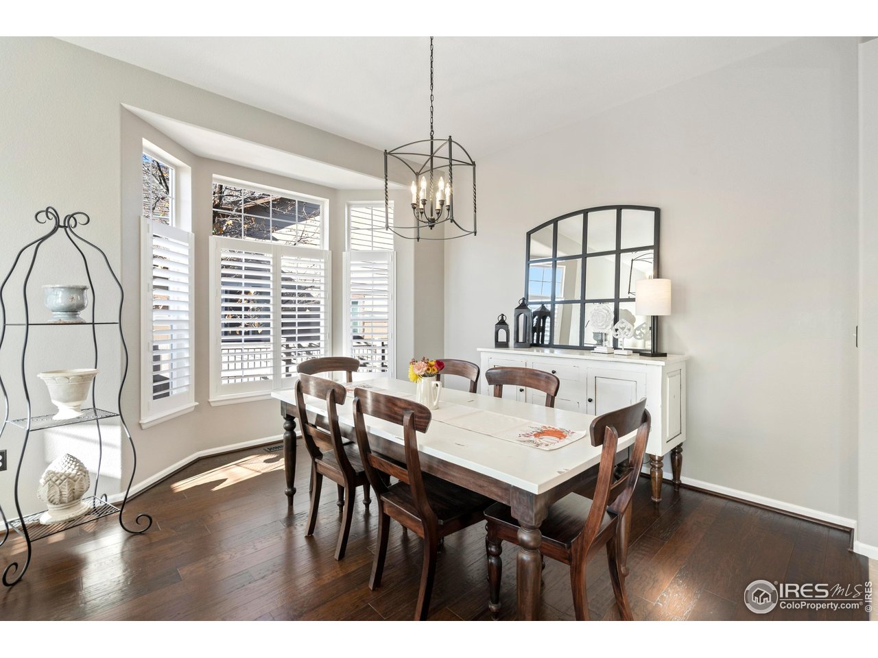 6685 Sage Avenue Firestone, CO 80504 - Photo 6 of 22 a view of a dining room with furniture window and outside view