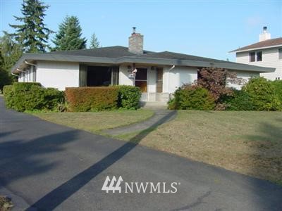 6328 Cady Road Everett, WA 98203 - Photo 1 of 1 a front view of a house with a yard