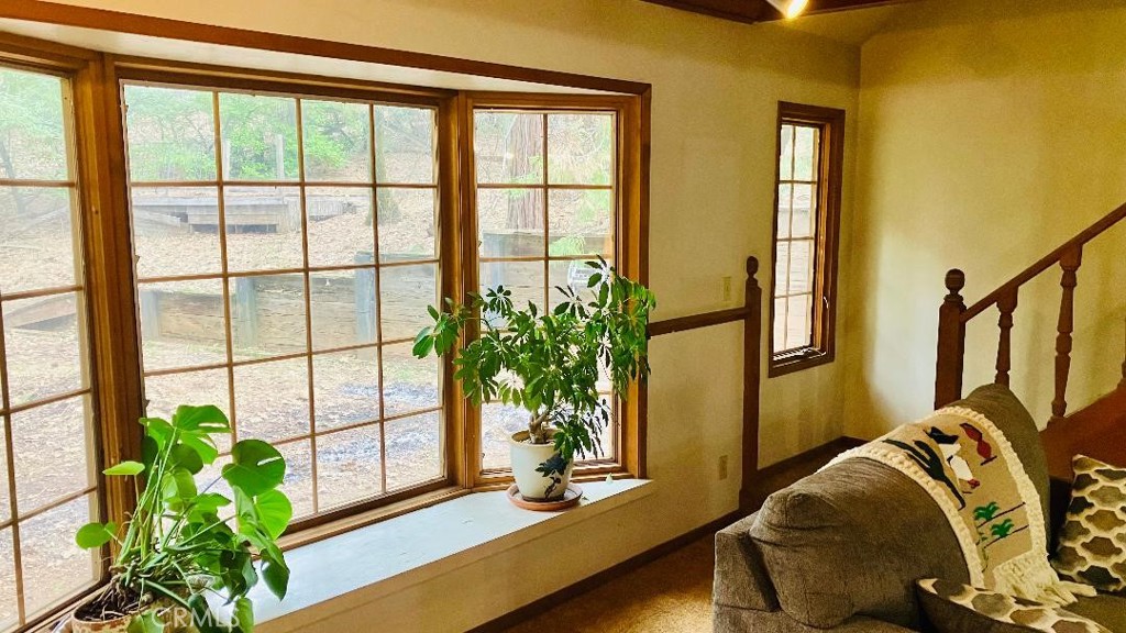 4920 Tippytoe Lane Forest Ranch, CA 95942 - Photo 11 of 36 a bed sitting in a bedroom next to a window