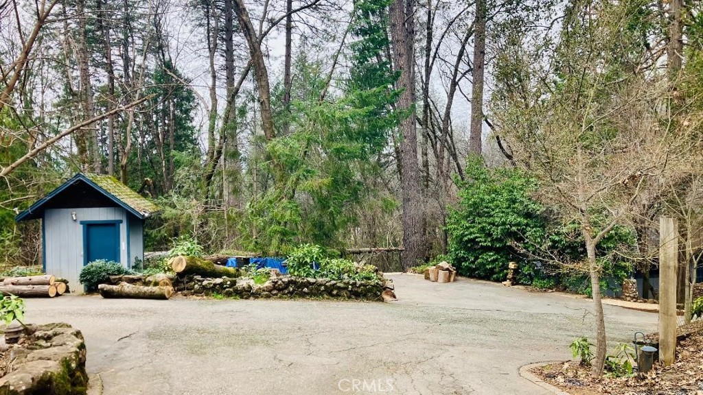 4920 Tippytoe Lane Forest Ranch, CA 95942 - Photo 7 of 36 a view of a car park in front of house