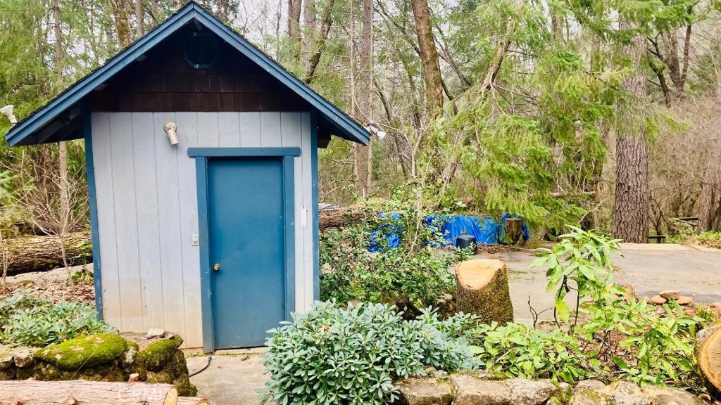 4920 Tippytoe Lane Forest Ranch, CA 95942 - Photo 9 of 36 a front view of a house with garden