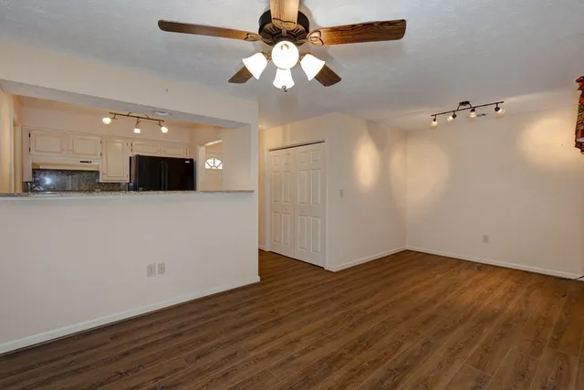 a kitchen that has a sink and a stove