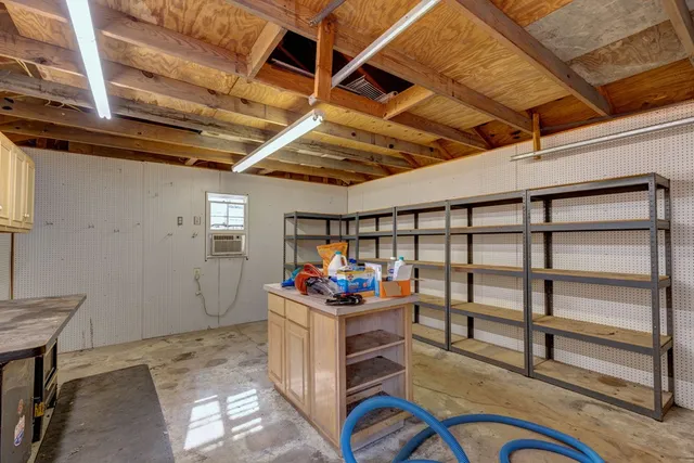 a picture of a wall with a white wall and a white refrigerator
