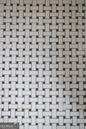 a brick wall with a mirror