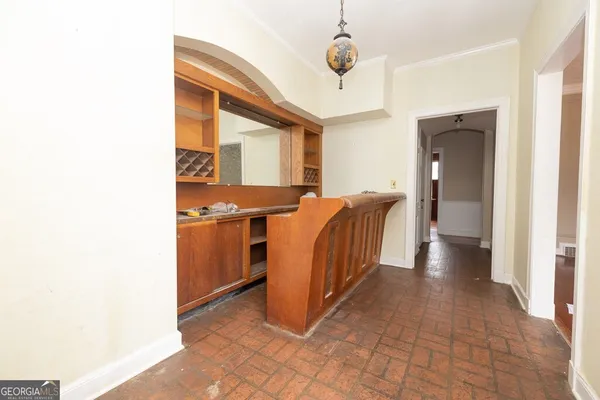 a view of a kitchen with furniture and a window