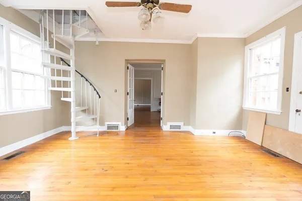 a view of an empty room with a window