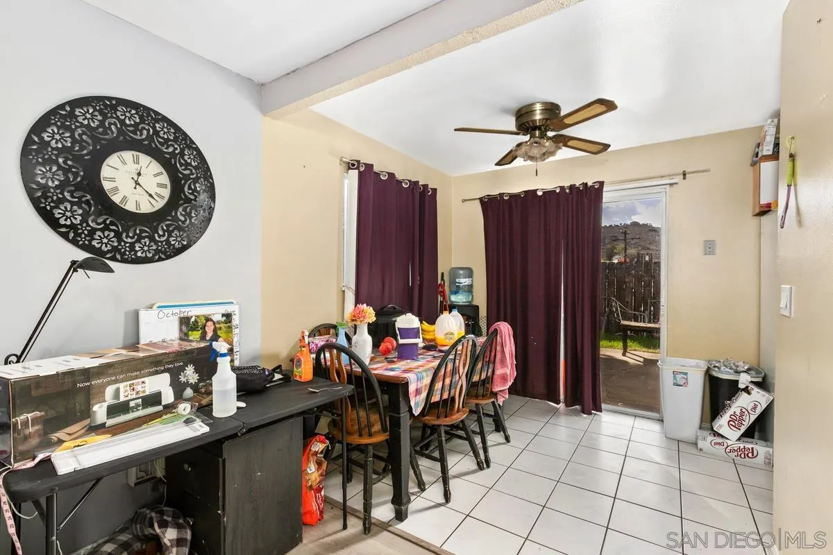 9136 Northcote Road Santee, CA 92071 - Photo 3 of 10 a view of a dining room with furniture and chandelier
