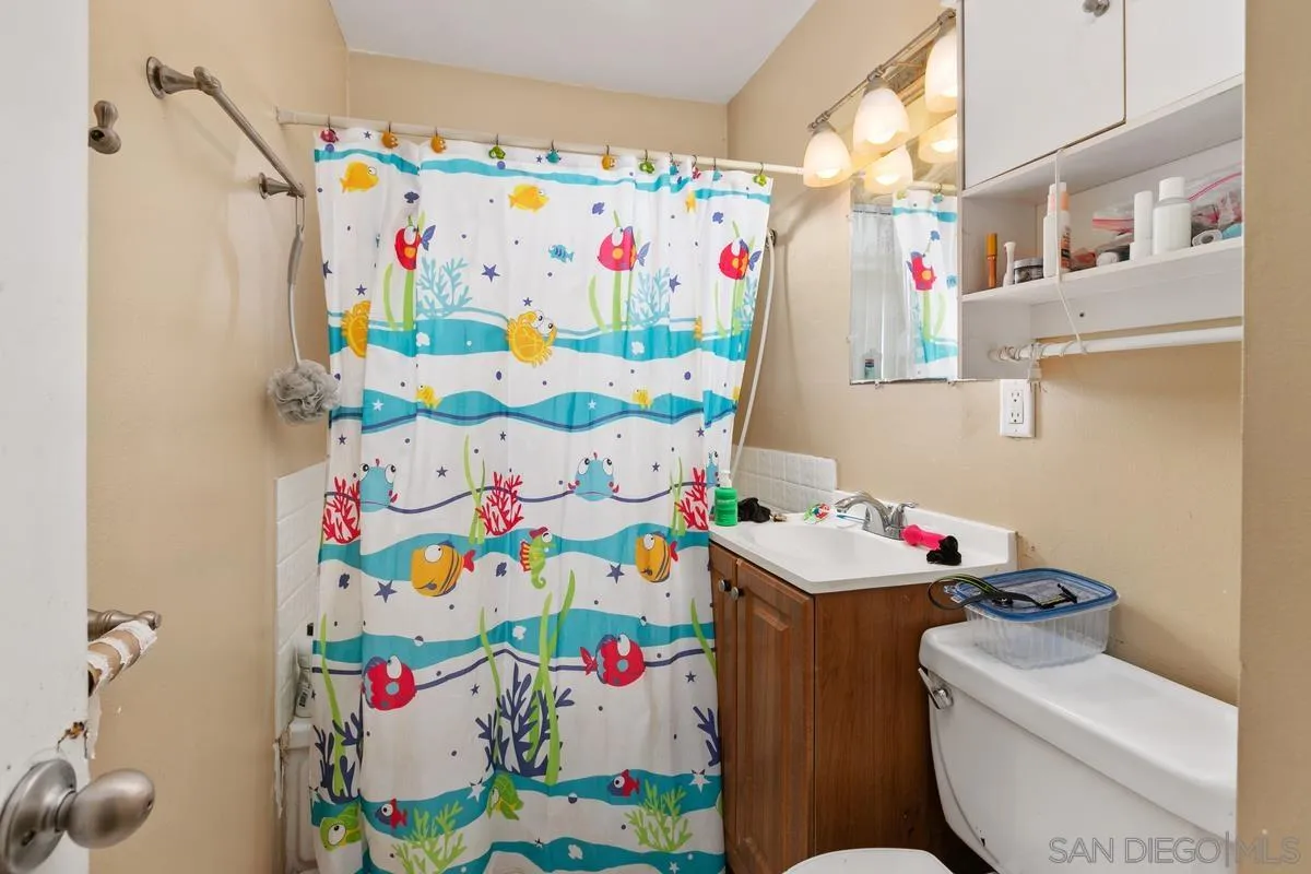 9136 Northcote Road Santee, CA 92071 - Photo 9 of 10 a utility room with fridge and closet