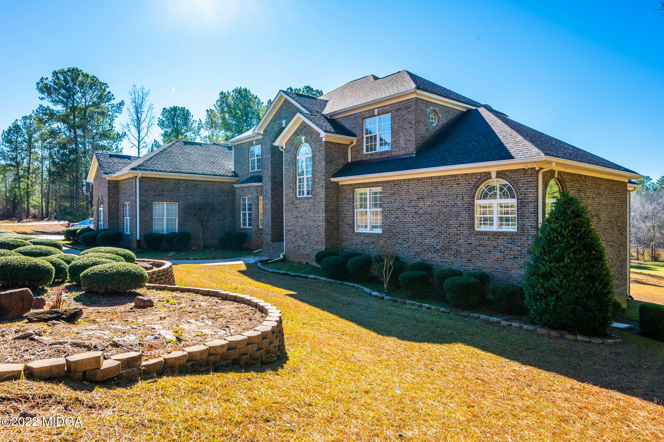 176 Tumbling Shoals Drive Gray, GA 31032 - Photo 1 of 51 a front view of a house with garden