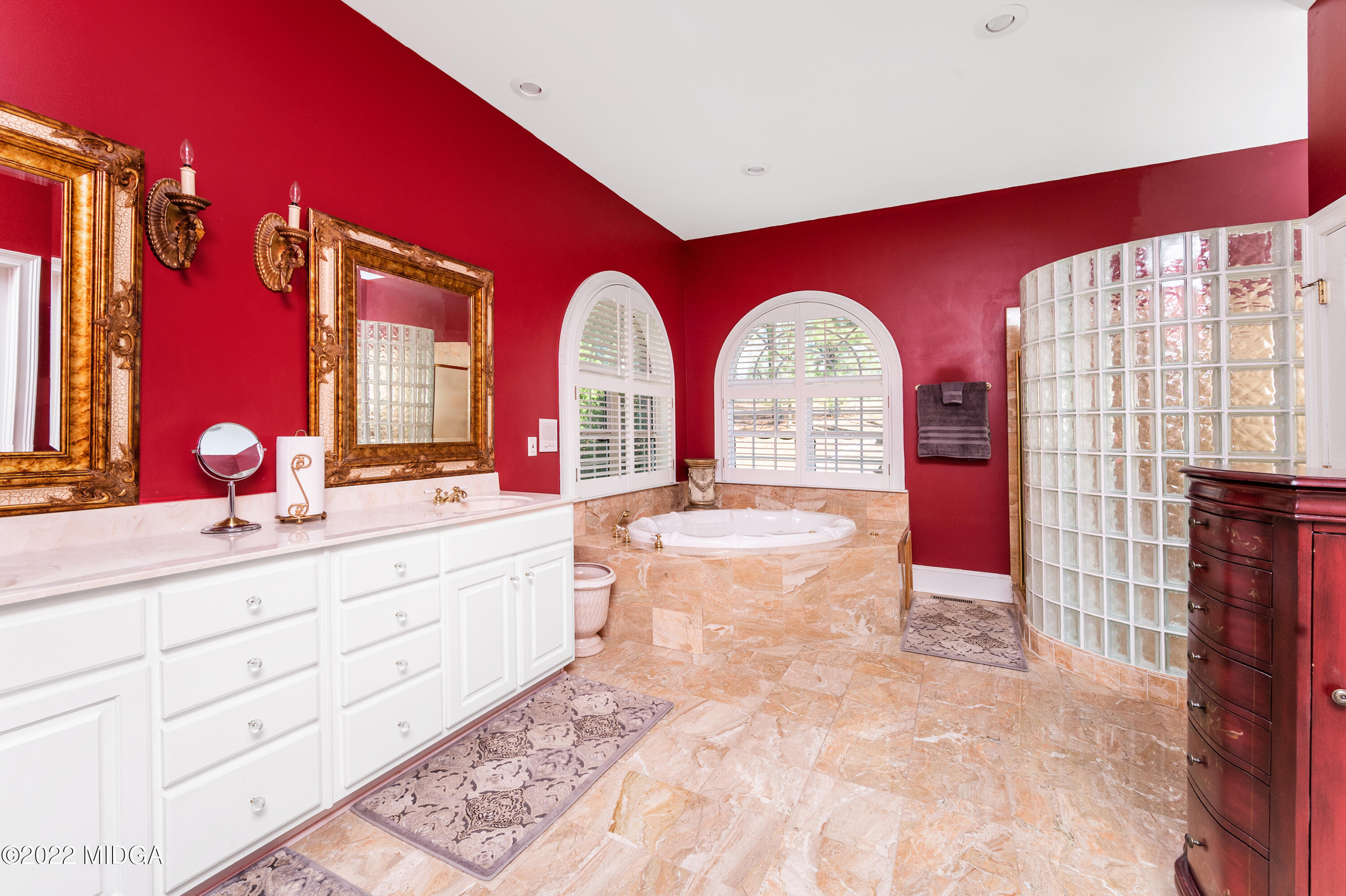 176 Tumbling Shoals Drive Gray, GA 31032 - Photo 16 of 51 a large bathroom with mirror a sink and a large mirror