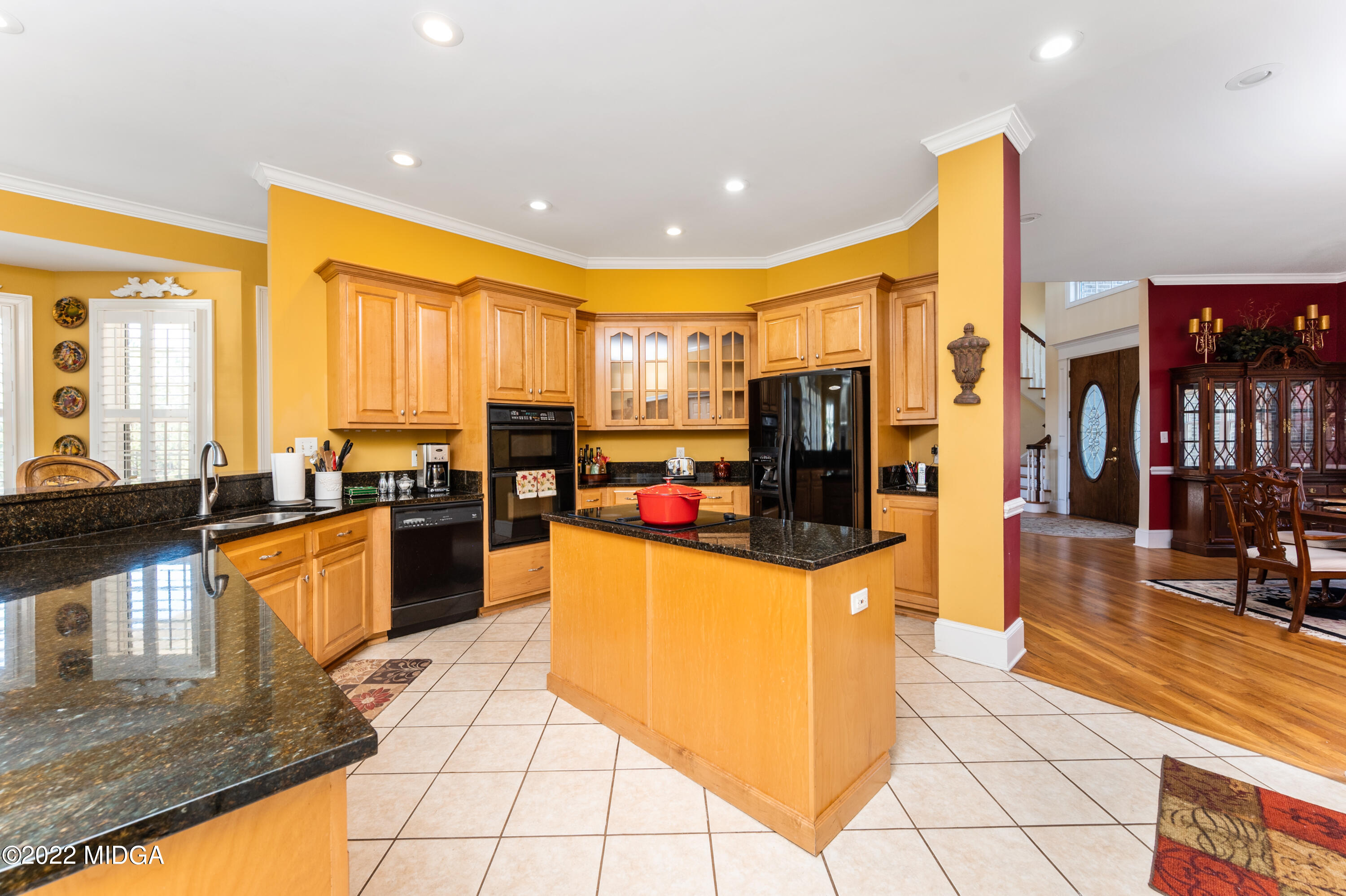 176 Tumbling Shoals Drive Gray, GA 31032 - Photo 29 of 51 a large kitchen with lots of counter top space and stainless steel appliances