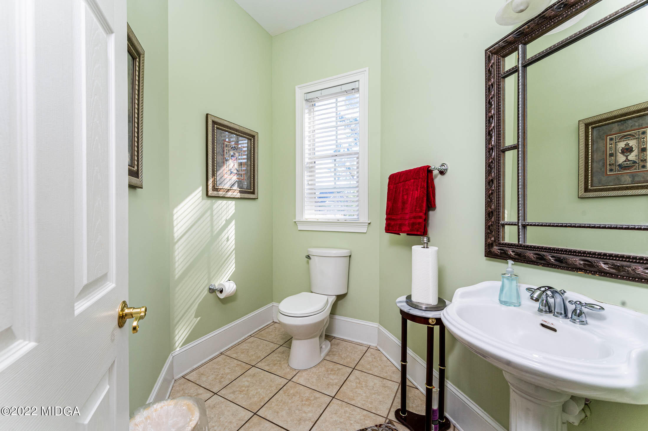176 Tumbling Shoals Drive Gray, GA 31032 - Photo 32 of 51 a bathroom with a sink toilet and mirror