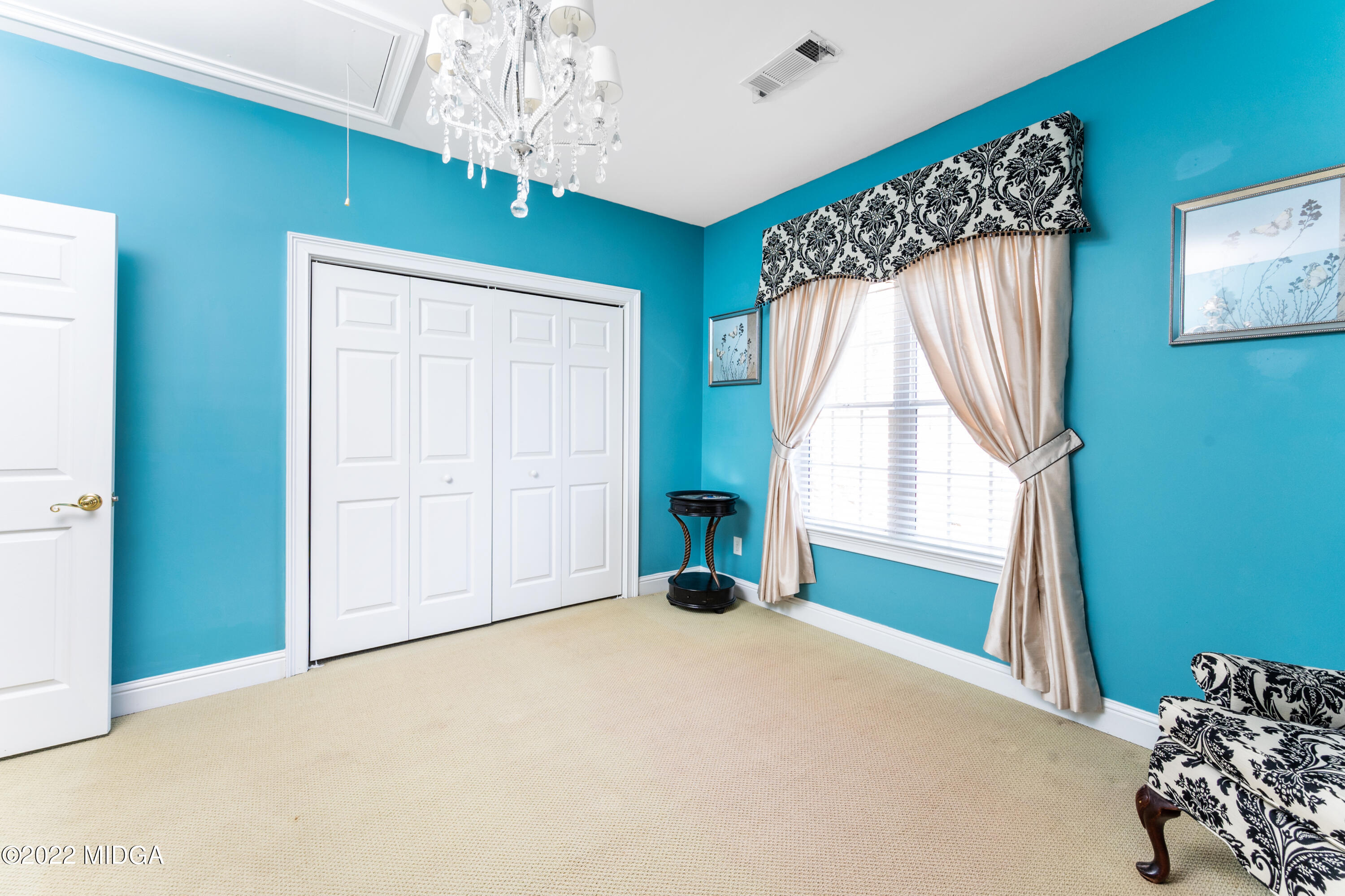 176 Tumbling Shoals Drive Gray, GA 31032 - Photo 42 of 51 a view of a livingroom with a staircase