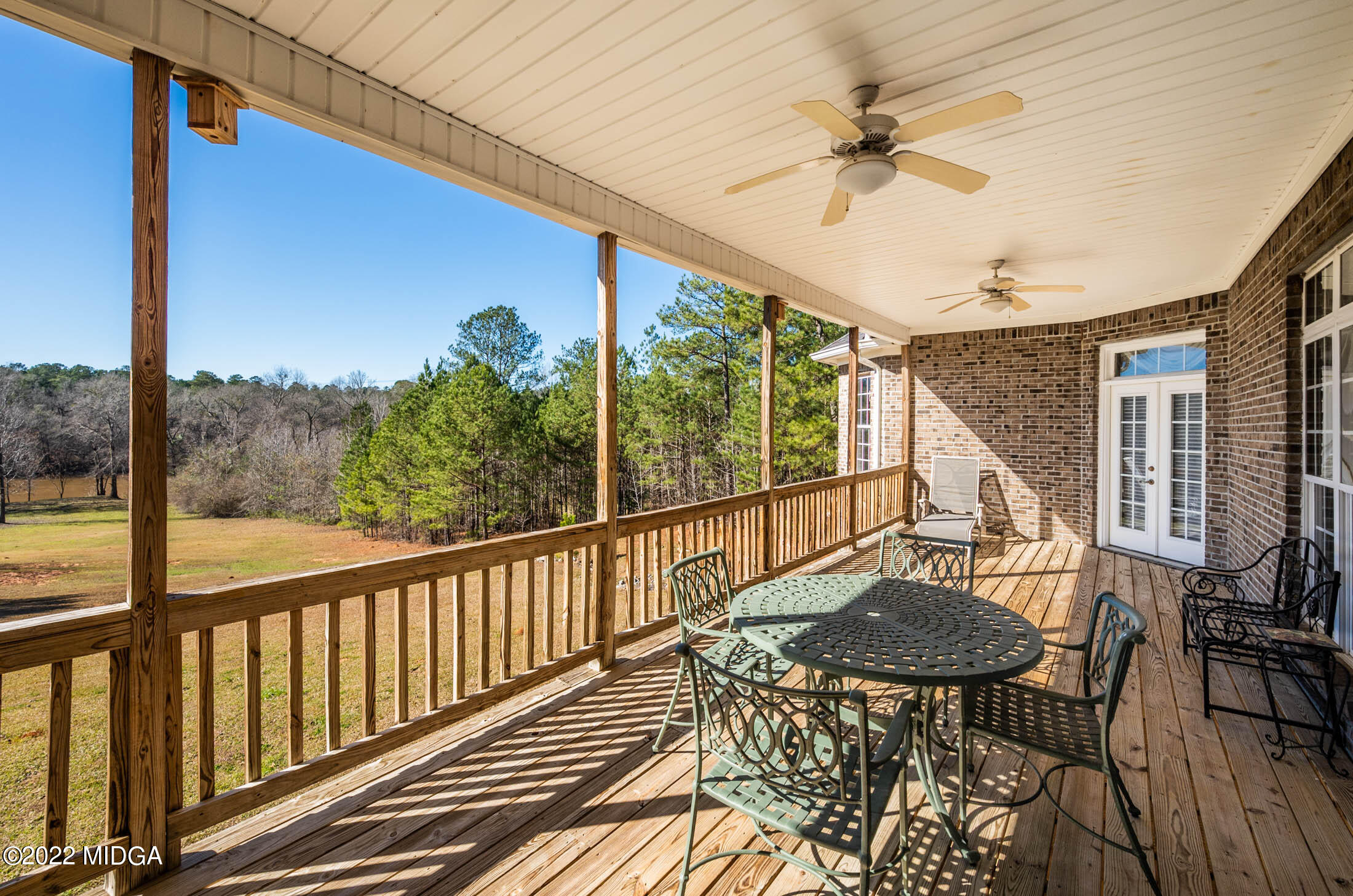 176 Tumbling Shoals Drive Gray, GA 31032 - Photo 45 of 51 a view of a balcony with furniture