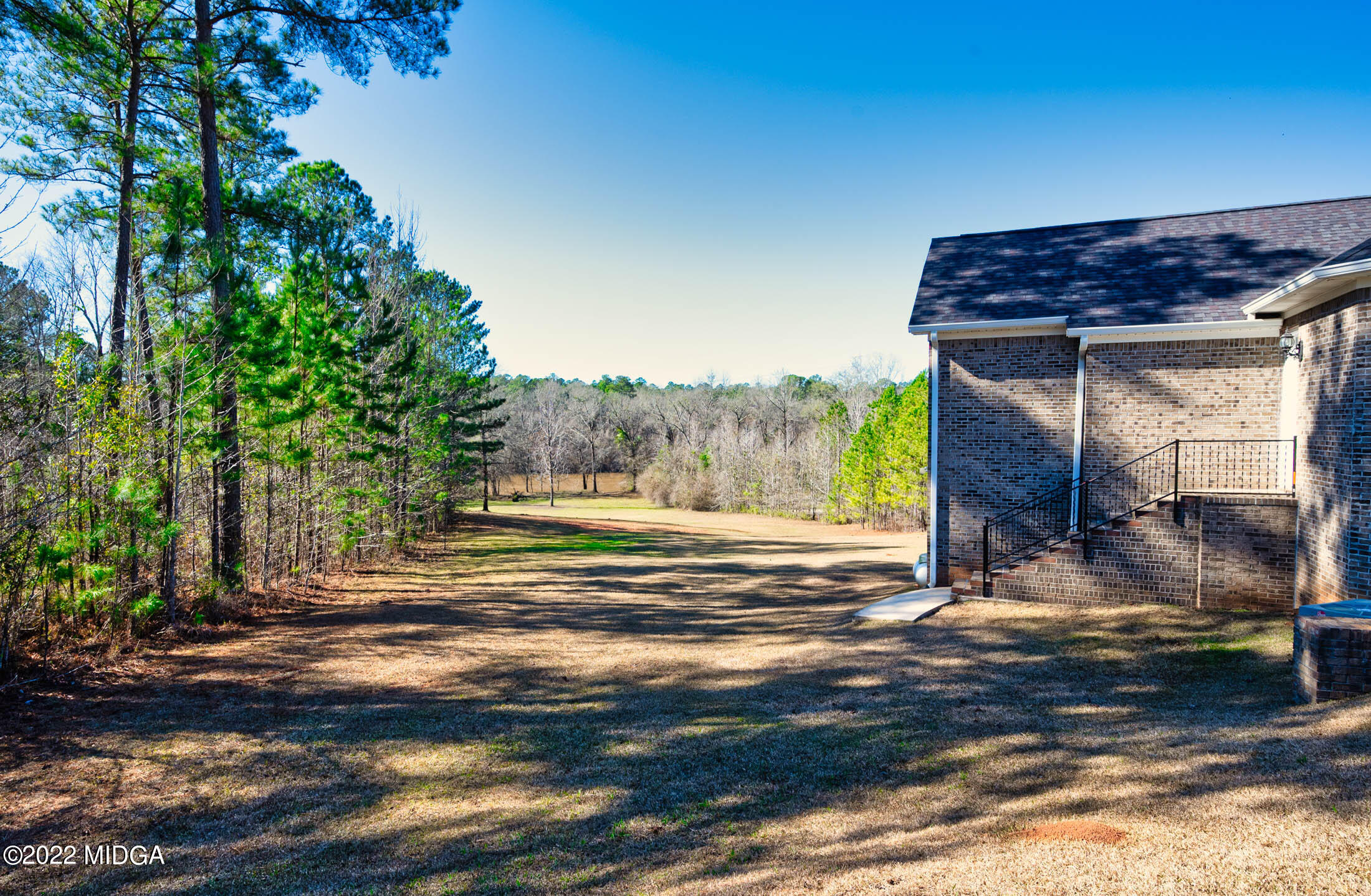 176 Tumbling Shoals Drive Gray, GA 31032 - Photo 6 of 51 a view of a house with a tree