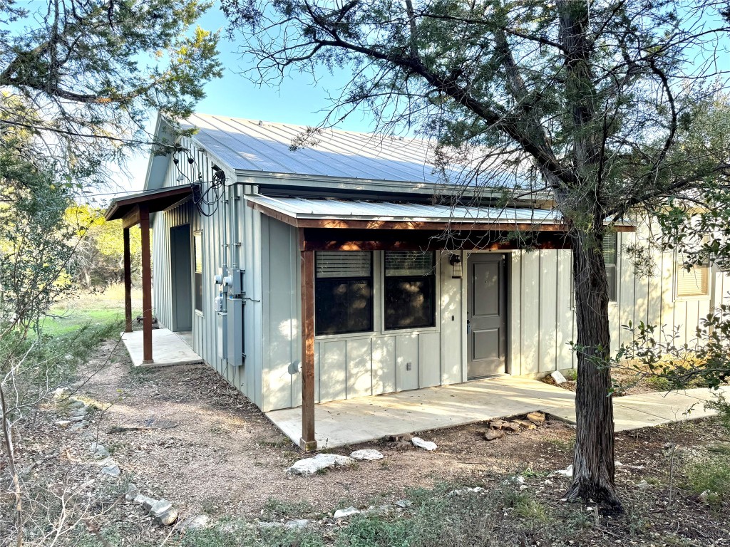290 Hugo Road, Unit A San Marcos, TX 78666 - Photo 1 of 25 a front view of a house with a porch
