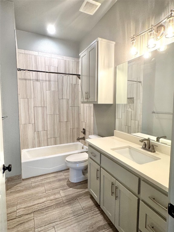 290 Hugo Road, Unit A San Marcos, TX 78666 - Photo 11 of 25 a bathroom with a sink a toilet and a bathtub