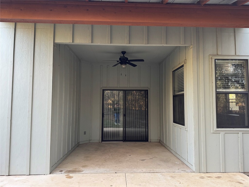 290 Hugo Road, Unit A San Marcos, TX 78666 - Photo 22 of 25 a view of a hallway with a chandelier