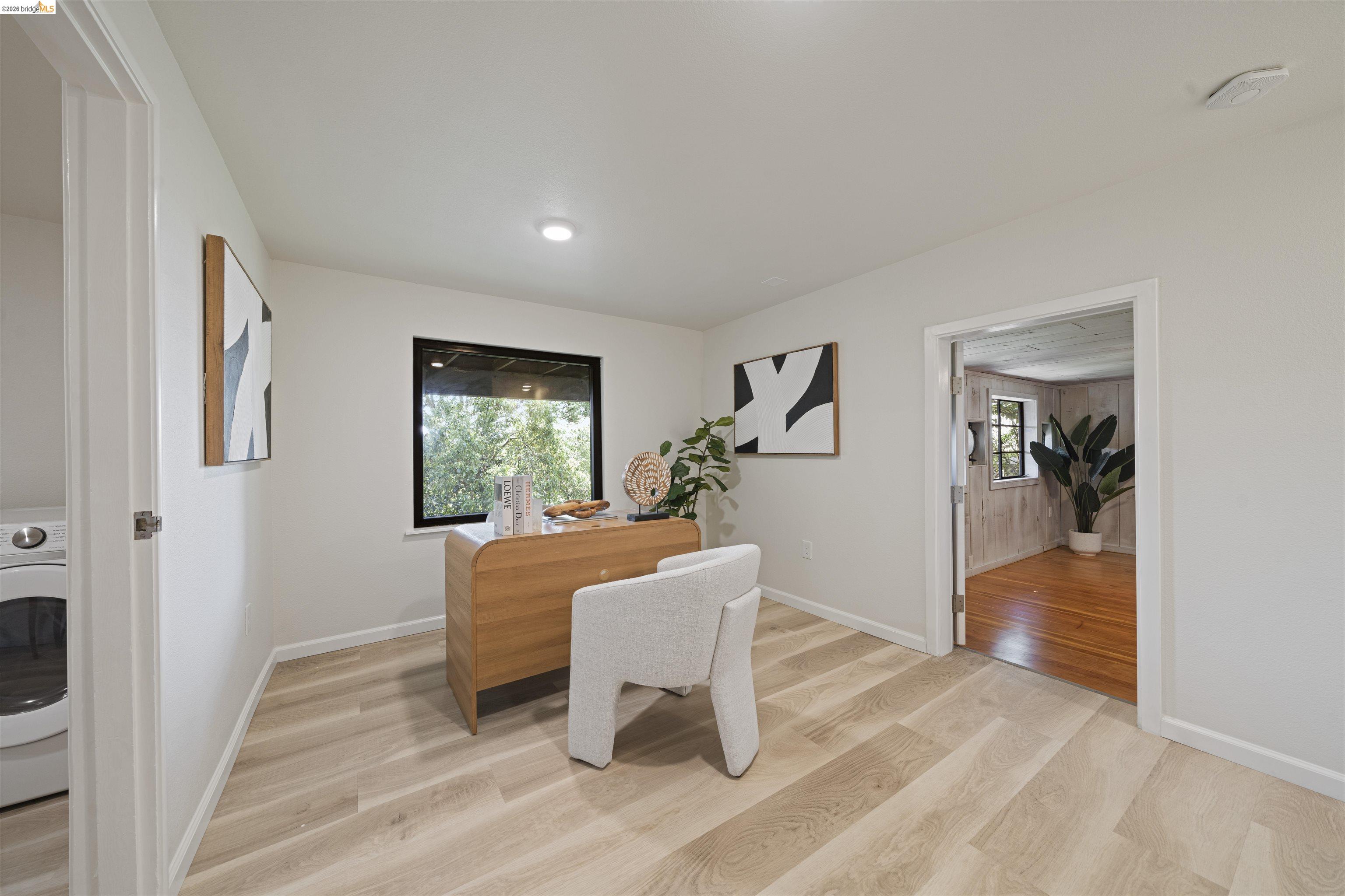 1170 Sterling Avenue Berkeley, CA 94708 - Photo 36 of 52 Home office with washer / clothes dryer and light wood-style flooring