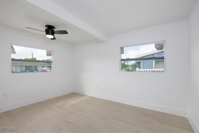 an empty room with windows