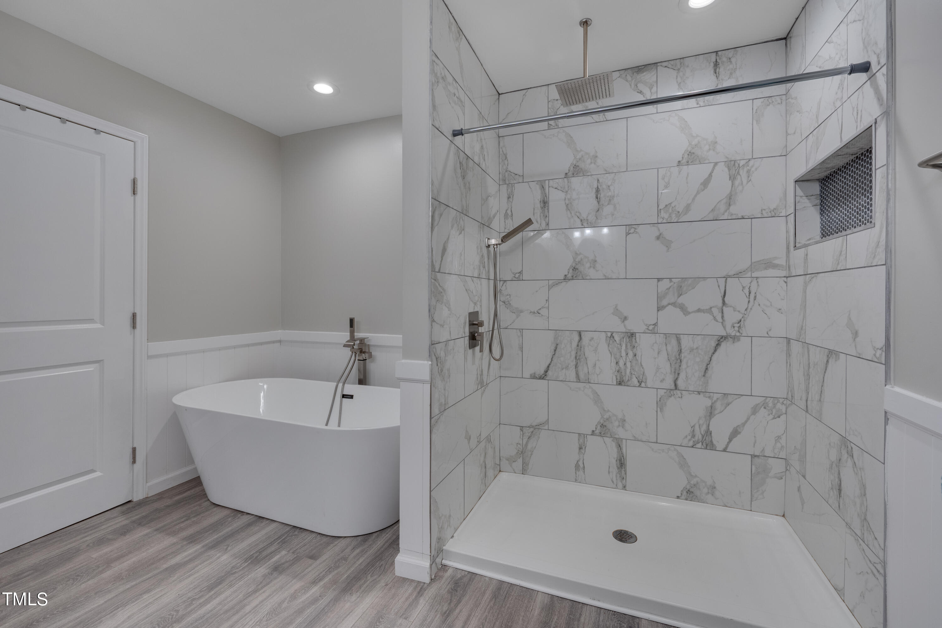 1620 Riddle Road Durham, NC 27713 - Photo 15 of 18 a bathroom with a bathtub and shower