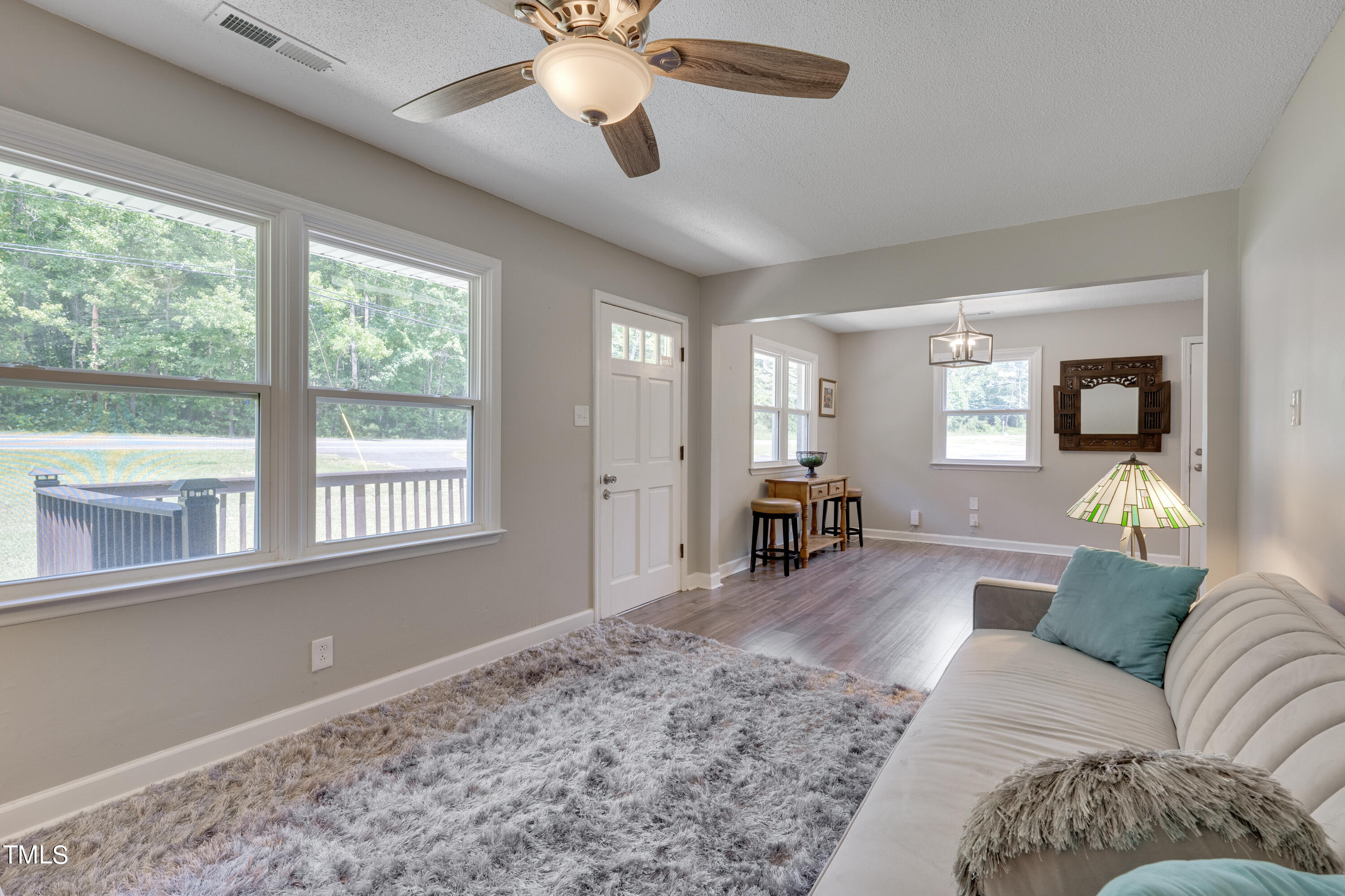1620 Riddle Road Durham, NC 27713 - Photo 4 of 18 a living room with furniture and a large window