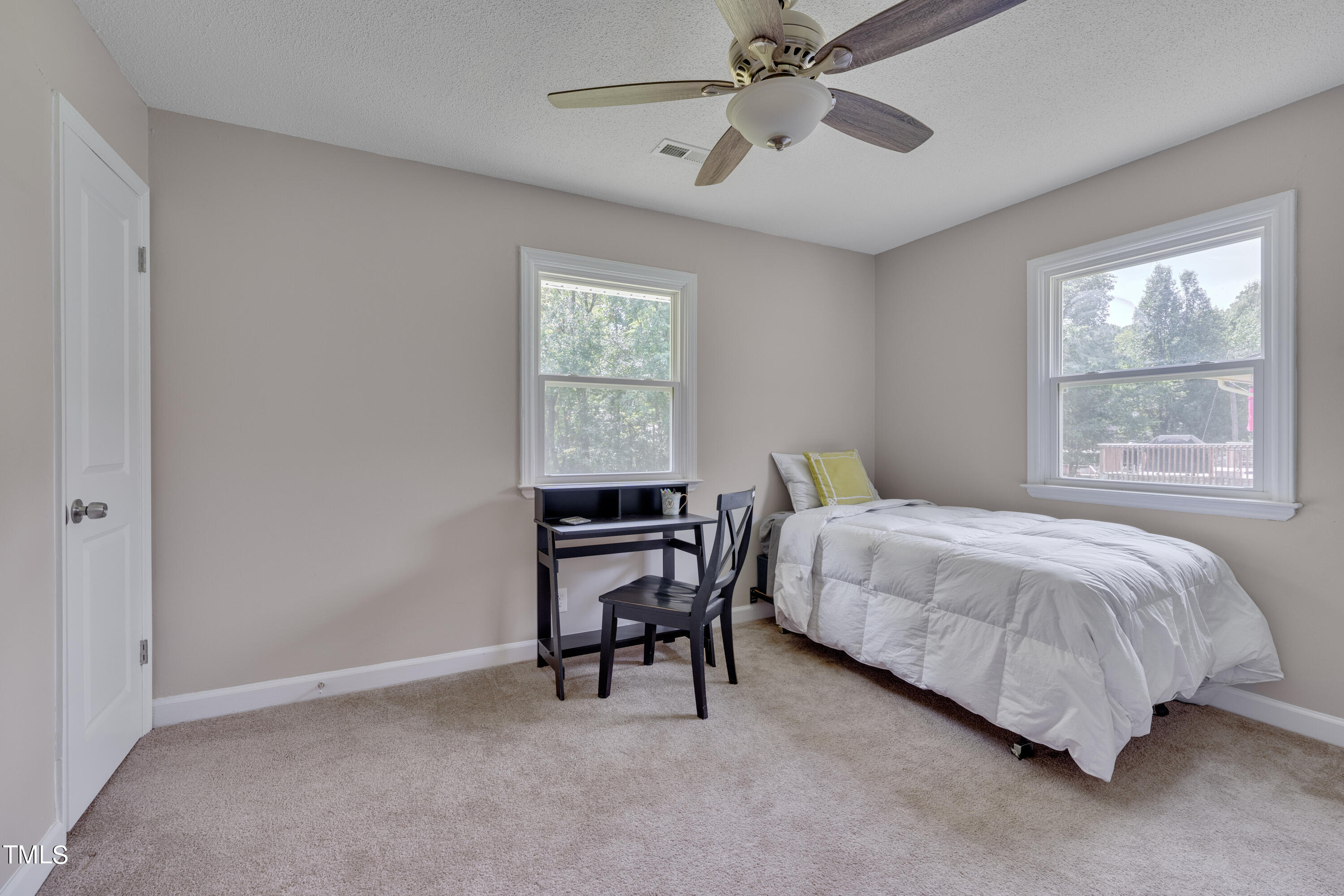 1620 Riddle Road Durham, NC 27713 - Photo 10 of 18 a bedroom with a bed and a window