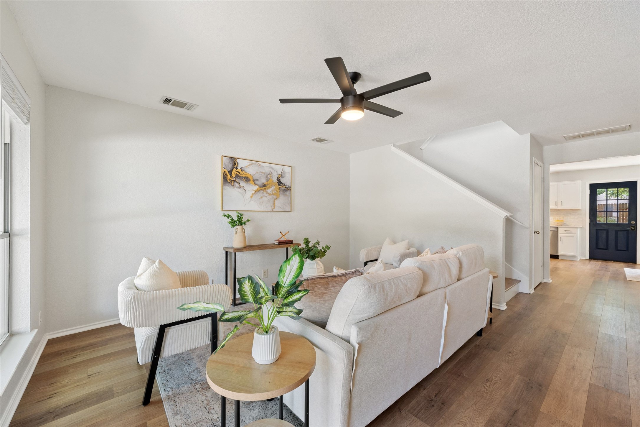4529 Best Way Austin, TX 78725 - Photo 2 of 34 Main living area with large windows that let in a ton of natural light