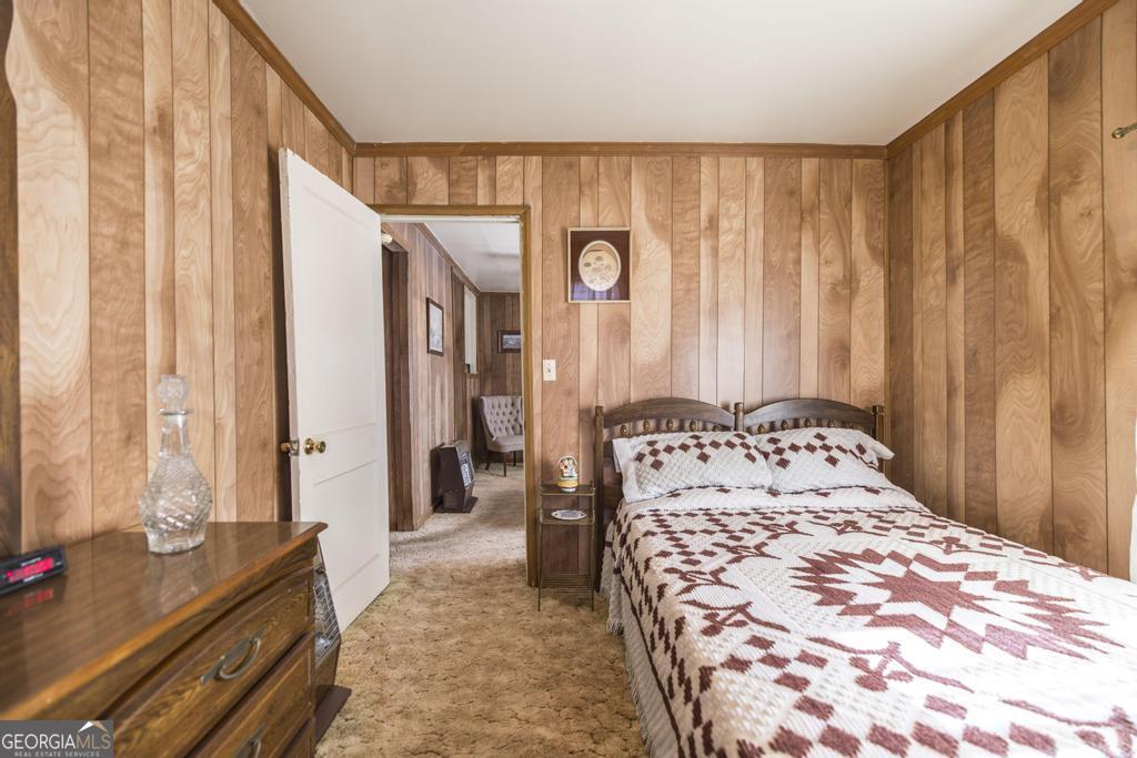 205 Georgia Avenue Fort Valley, GA 31030 - Photo 16 of 23 a bedroom with a bed and a window