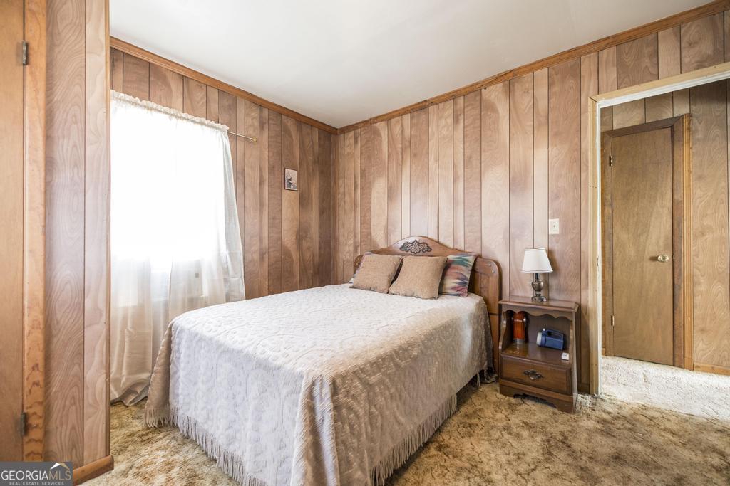 205 Georgia Avenue Fort Valley, GA 31030 - Photo 19 of 23 a bedroom with a bed and a window