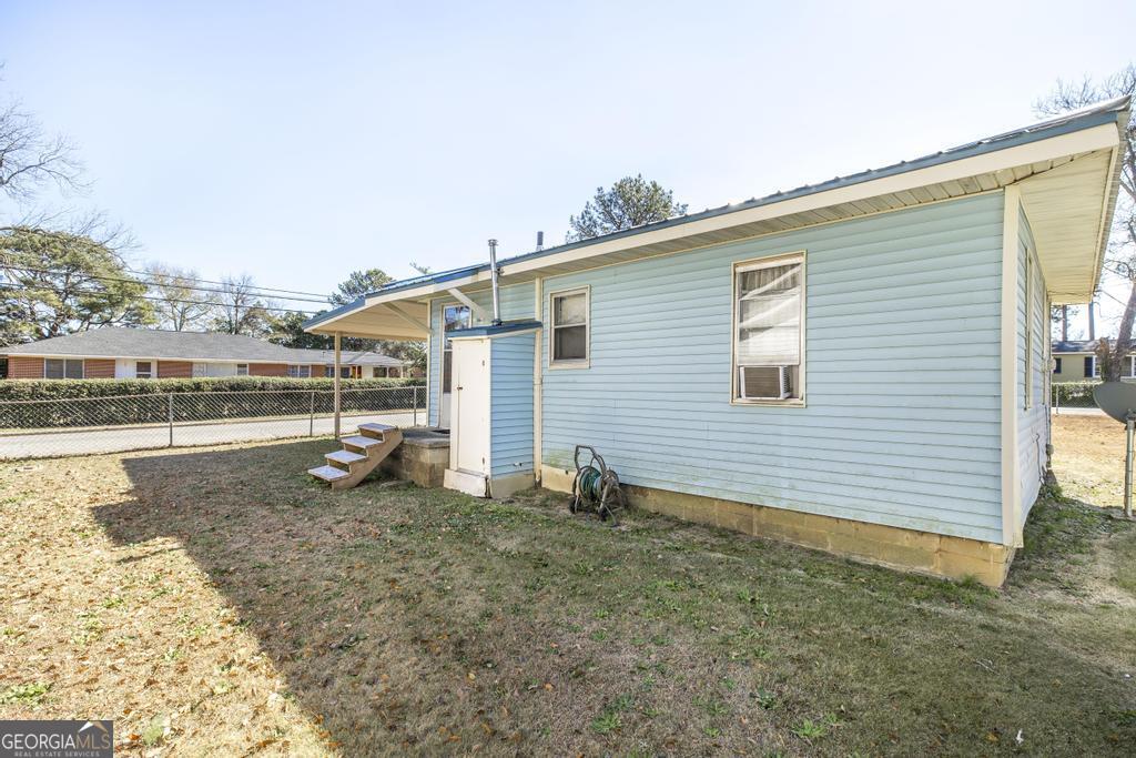205 Georgia Avenue Fort Valley, GA 31030 - Photo 20 of 23 a view of a house with backyard