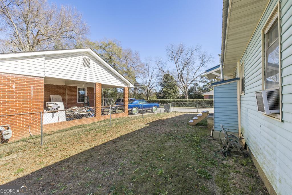 205 Georgia Avenue Fort Valley, GA 31030 - Photo 23 of 23 a view of a backyard with sitting area