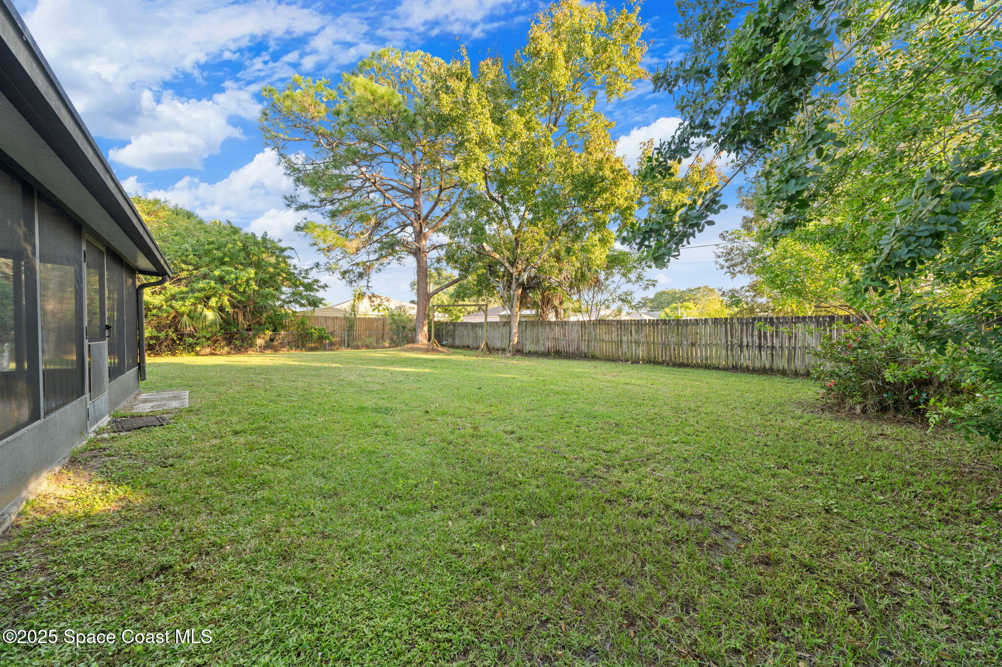 410 Albenga Road Northwest Palm Bay, FL 32907 - Photo 21 of 23 a view of yard with green space